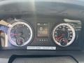 The dashboard of a 2016 RAM 5500 displaying speedometer fuel gauge and information screen with a note about winter sand scoop