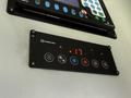 A control panel from a Thermo King refrigeration unit displaying a temperature reading of 17 with various buttons for setting functions