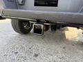 Close-up of the hitch receiver on a 2021 Ford F-150 showing the square opening for towing accessories