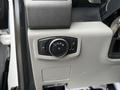 A control panel in a 2017 Ford F-450 Super Duty featuring knobs and buttons for lighting and other functions