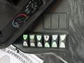 Control panel of a 2021 Ford Econoline featuring buttons for opening doors lights and other functions