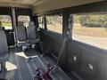 Interior view of a 2020 RAM ProMaster 3500 showing two gray passenger seats with seatbelts installed on the floor
