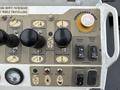 A control panel with various buttons and joysticks labeled for winch operations engine speed and emergency stop functions