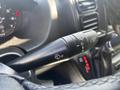 Close-up of the windshield wiper control stalk in a 2022 RAM Promaster 350 featuring symbols for wiper speeds and washer fluid