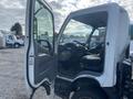 A 2019 Hino 195 truck with an open driver's side door revealing the interior cab and driver's seat