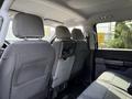 Interior view of the backseat of a 2021 Ford F-150 with gray fabric seats and headrests visible