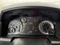Dashboard of a 2018 RAM 1500 showing speedometer, tachometer, fuel gauge, and a digital display with various vehicle information