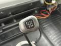 A gear shift knob from a 2003 Freightliner FL70 with the gear pattern R135 246 displayed on its surface