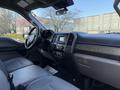 Interior view of a 2020 Ford F-550 showing the dashboard seats and controls