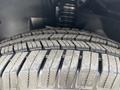 Close-up of a tire with detailed tread pattern designed for a 2020 Mercedes-Benz Sprinter 2500