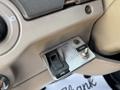 Close-up of the control panel in a 2006 Sterling Acterra featuring switches for system power PTO and crane operation