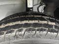 Close-up of a tire from a 2023 RAM Promaster 3500 showing detailed tread patterns and surface texture