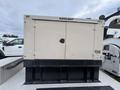 A 2005 Trailerman Generator Trailer featuring a beige generator compartment with a black base and a door in the center labeled with the number 156 and the brand Katolight on top