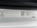 A 2005 Freightliner M2 106 truck identification label displaying vehicle information and specifications