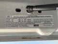 A 2009 Ford F-550 vehicle emissions information label showing specifications and compliance details for the engine and fuel requirements