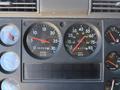 Dashboard of a 2004 American LaFrance Eagle featuring various gauges for RPM speed and fuel levels