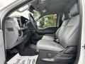 Interior of a 2023 Ford F-450 Super Duty featuring gray leather seats a steering wheel and a dashboard with controls