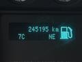 A digital display showing the odometer reading of 245195 km and fuel gauge on a 2015 Ford F-450