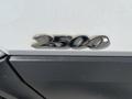Close-up of a silver 2500 badge on a 2010 Mercedes-Benz Sprinter vehicle