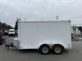 A 2016 Continental cargo trailer with a white exterior and dual wheels visible on the sides