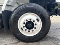 Close-up of a Goodyear G661 HSA tire mounted on a 2012 International 7300 Workstar truck showing the wheel and lug nuts