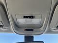 Interior view of a 2017 Chevrolet Colorado ceiling featuring overhead lights and controls for the sunroof