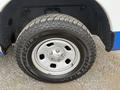 Close-up of a tire mounted on a silver wheel with the brand name Hercules visible on the tread of the tire