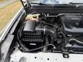 Close-up of a 2017 Chevrolet Colorado engine bay showing the air intake system and Duramax 2.8 emblem
