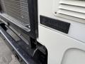 Close-up of a 2010 Autocar Xpeditor featuring a prominent Allison Transmission logo on the front panel