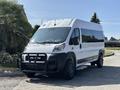 A 2022 RAM Promaster 350 van with a white exterior and black front grille parked on a driveway