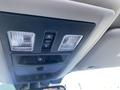 Interior overhead console of a 2017 RAM 1500 featuring light controls and vent switches