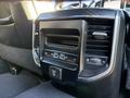 Interior dashboard controls of a 2023 RAM 3500 with air vents and multimedia interface visible