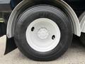 A Michelin XTA22 tire mounted on a rim of a 2013 International Workstar 7500 truck
