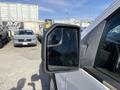 A side mirror of a 2018 Ford F-150 showing a clear reflection