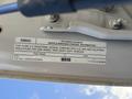 2020 Ford F-550 diesel truck with a label detailing vehicle emission control information and specifications