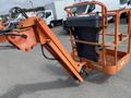 A 2009 JLG E300AJP aerial lift with an orange boom arm and a gray platform for elevating personnel and equipment