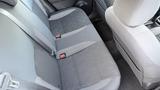 Interior view of the back seat of a 2019 Nissan Kicks featuring black fabric upholstery with a quilted design and seatbelts visible on both sides