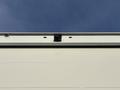 Close-up of the roof of a 2022 Lion Lion6 vehicle showing the top section with a camera and lights