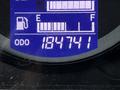 The dashboard display of a 2017 Hino 338 showing the odometer reading of 184741 and the fuel gauge positioned between empty and full