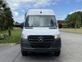 A 2022 Mercedes-Benz Sprinter van with a white exterior and a black grille facing forward