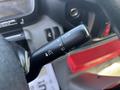Close-up of the steering column indicator stalk from a 2018 Hino 195 featuring various controls for wipers headlights and turn signals