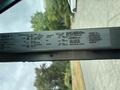 A 2018 Ford Econoline vehicle identification label detailing specifications and manufacturing information