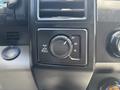 Control panel of a 2019 Ford F-150 featuring a four-wheel drive selector dial with settings for 2H 4H and 4L