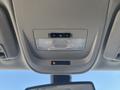 Interior view of a 2017 Chevrolet Colorado showing the overhead console with lights and a small display panel