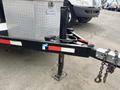 A 2005 Katolight SED60FPJ4 generator with a metal frame and a hydraulic jack for stabilization on a flat surface