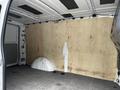 Interior of a 2020 Mercedes-Benz Metris van showing plywood paneling on the walls and a flat floor