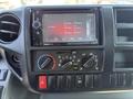 Dashboard of a 2020 Hino 155 with a touchscreen radio display and climate control knobs visible