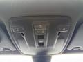 Interior ceiling control panel of a 2016 Mercedes-Benz GLA-250 featuring various buttons and vents