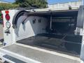 2017 Chevrolet Colorado with an open truck bed showing a clean interior and equipped with various mounting points and electrical wiring