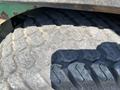 Close-up of a textured tire tread from a 2016 John Deere 1585 Terrain Cut showing deep grooves and rugged pattern designed for traction